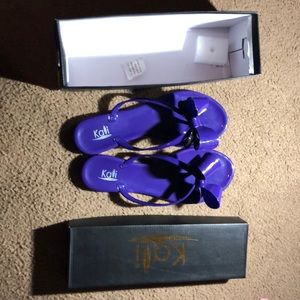 Kali flip flops size 8 purple